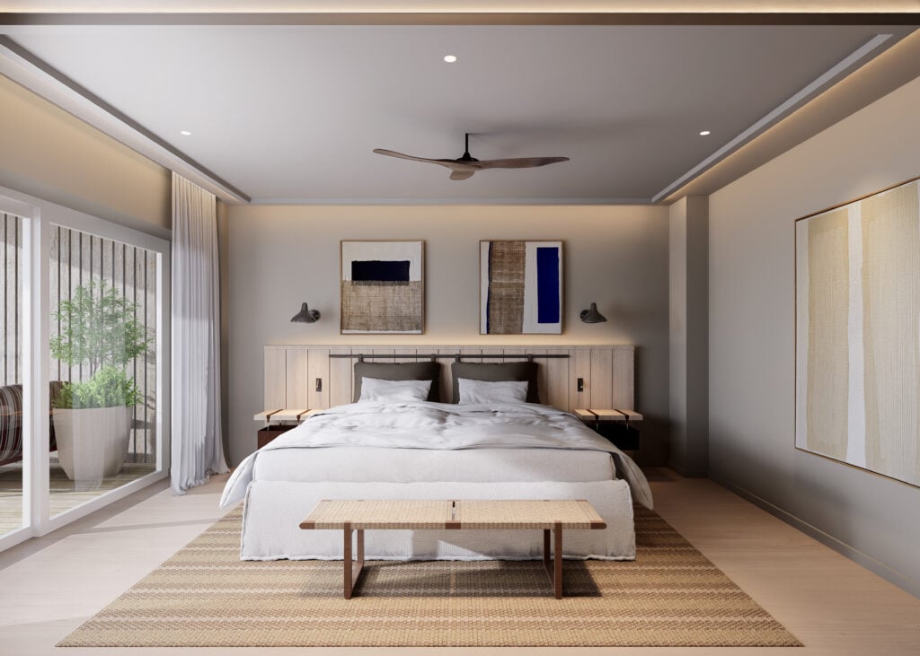 Modernes Musterzimmer mit großem Bett, Holzbank, Teppich, abstrakten Bildern und Zugang zu Terrasse in Boutique Resort