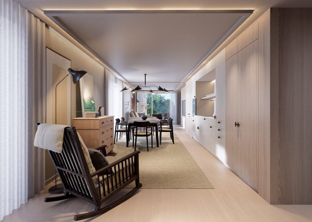 Moderne Küche und Essbereich in Musterzimmer mit Holzvertäfelung, Esstisch, Schaukelstuhl und großem Fenster im Boutique