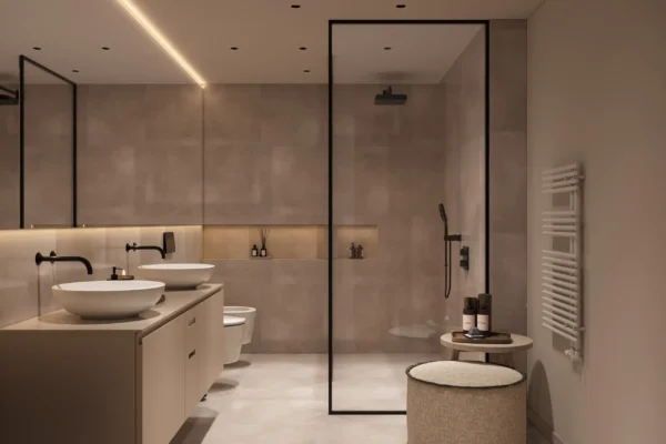 Modernes Badezimmer mit Doppelwaschbecken, bodengleicher Dusche, Sitzhocker und warmem Licht im Boutique Resort Schwarzwald