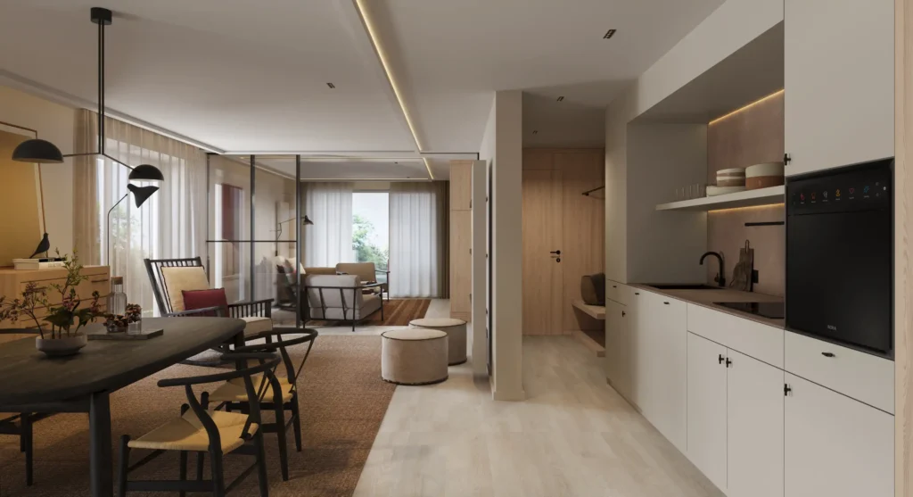 Moderne Boutique-Suite mit offener Küche, Essbereich, Sitzgelegenheiten und großem Fenster mit Blick ins Grüne im