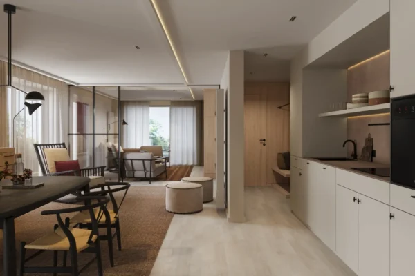 Moderne Boutique-Suite mit offener Küche, Essbereich, Sitzgelegenheiten und großem Fenster mit Blick ins Grüne im